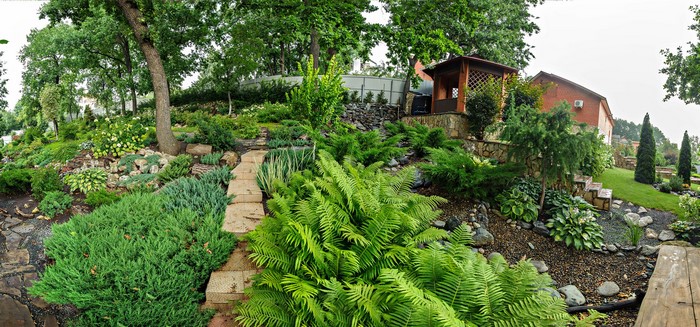 Landscaped garden with stone path and gazebo