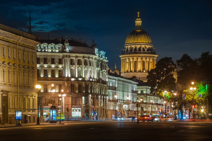 Saint Isaac's Cathedral and buildings at night in St. Petersburg