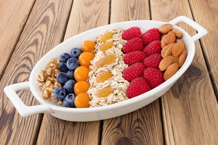 Muesli with Raspberries, Blueberries, Nuts, and Dried Fruit
