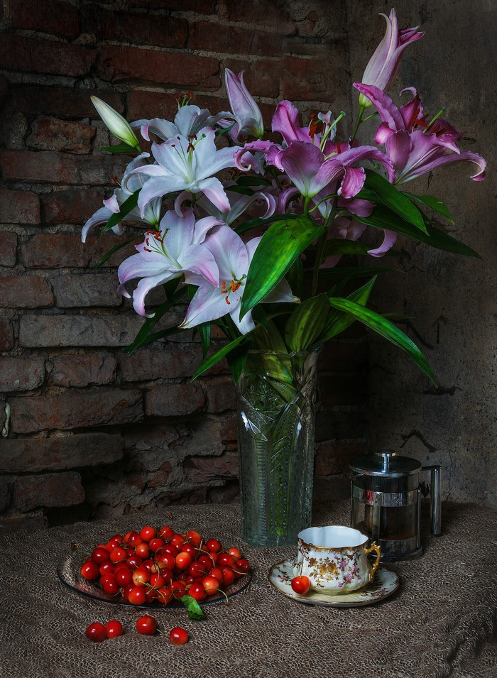 Still-life with lilies, cherries, and coffee set