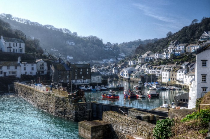 Polperro Cornwall United Kingdom harbor with boats and houses
