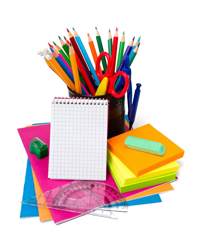 Stationery: Pencils, Notepad, and Supplies on White Background