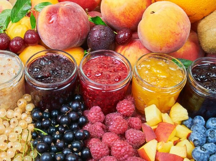 Jars of Jam with Fresh Fruits and Peaches