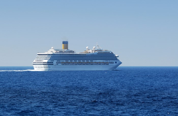 Cruise liner sailing on the blue sea
