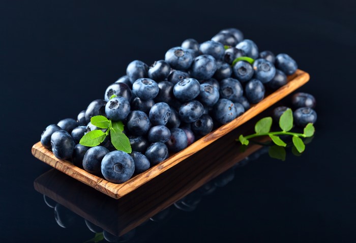 Blueberries in a wooden bowl