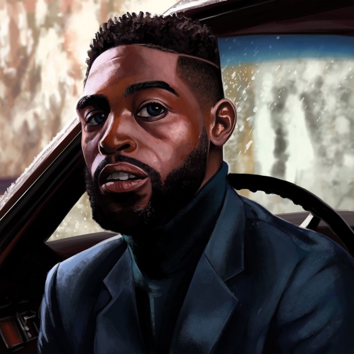Man in a suit in a car
