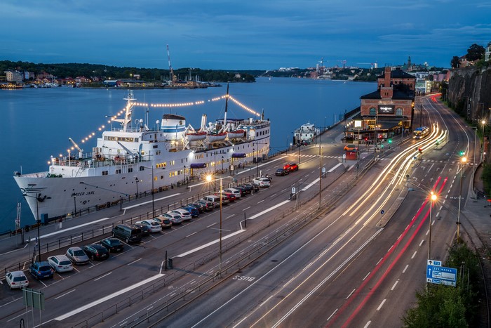 Ship docked in Stockholm harbor at dusk