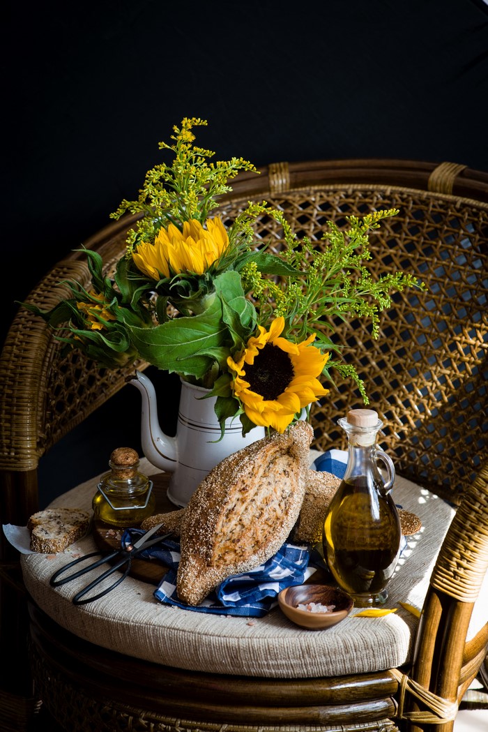Still-life with Sunflowers, Bread, and Olive Oil