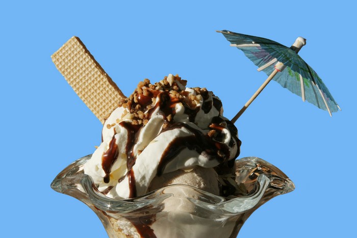 Ice cream sundae with wafer and umbrella