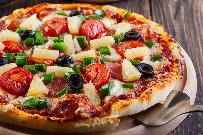 Pizza with Pineapples, Olives, and Tomatoes