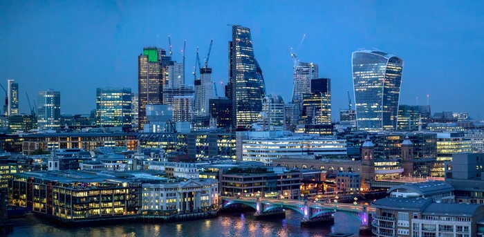 London skyline with skyscrapers and bridges at dusk
