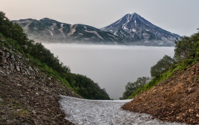 Volcanoes and fog on the Kamchatka Peninsula, Russia