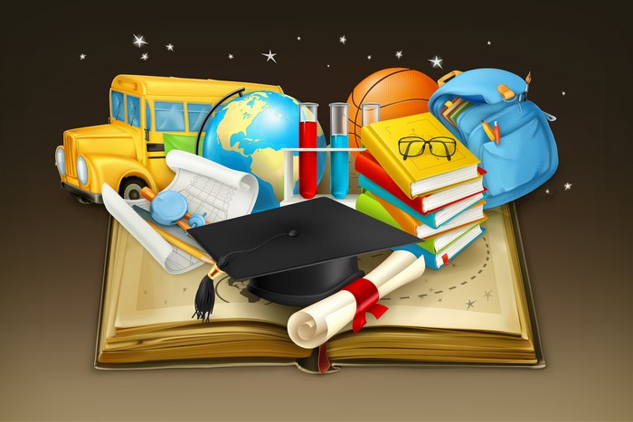 School supplies on an open book