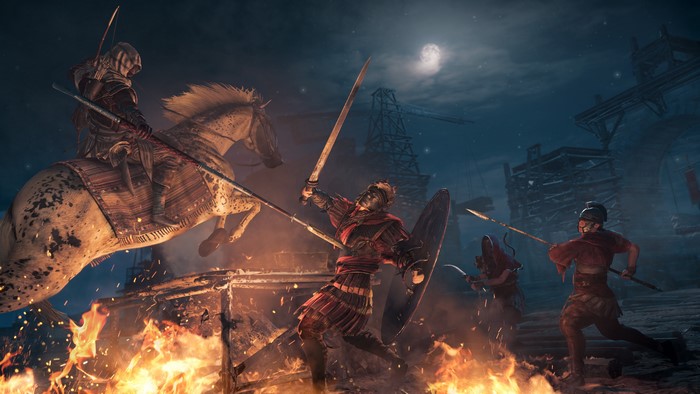 Warriors on horseback and foot battle with swords and spears at night