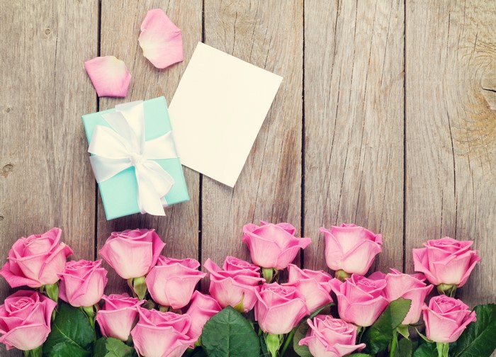 Pink Roses, Gift Box, and Card on Wood