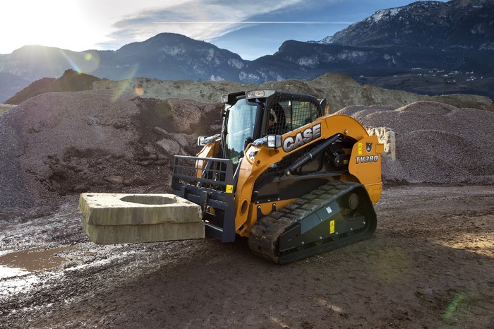 4K Case TV380 skid steer loader with concrete block