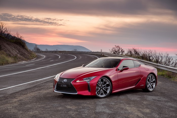 Red 2017 Lexus LC 500h on a Winding Road