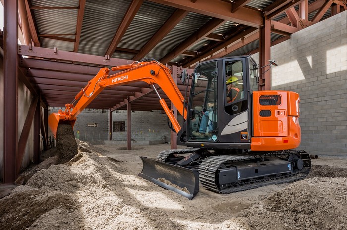 Hitachi ZX85US-5 excavator digging dirt