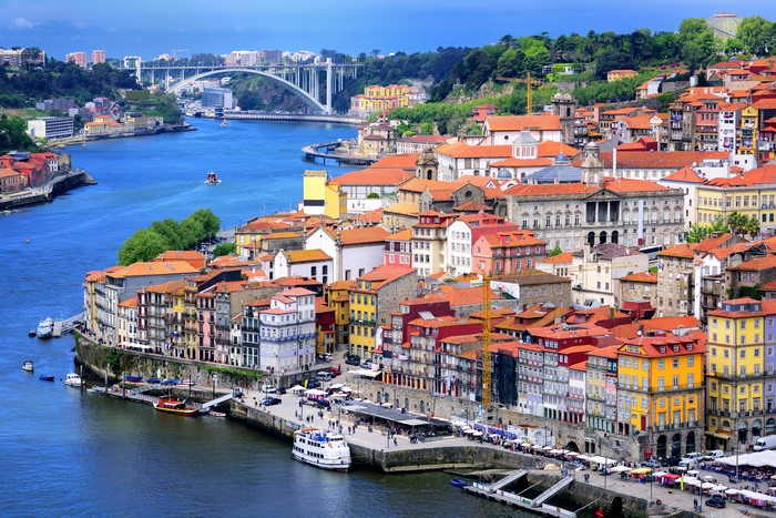 Porto, Portugal: Colorful Houses on the Douro River with Bridge