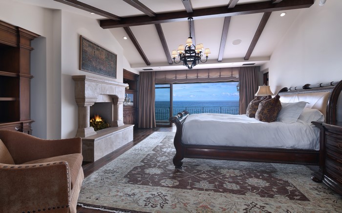 Luxury Bedroom with Ocean View and Fireplace