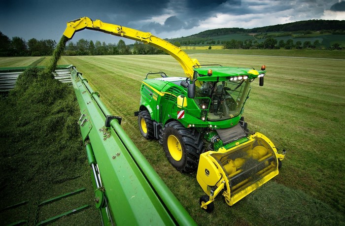 John Deere 8400i forage harvester in a field