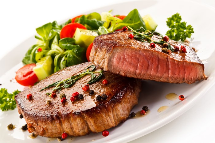 Steak with salad and spices