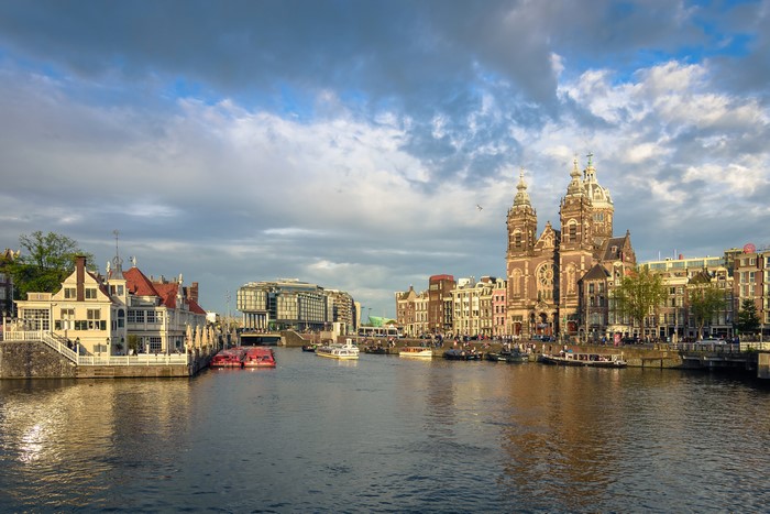Amsterdam canal with Basilica of Saint Nicholas