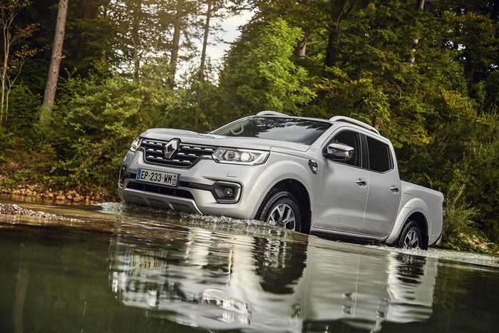 Renault Alaskan Pickup Truck Driving Through Water