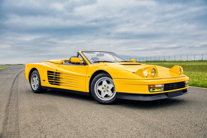 Yellow 1988-92 Lorenz Cabriolet on a Racetrack