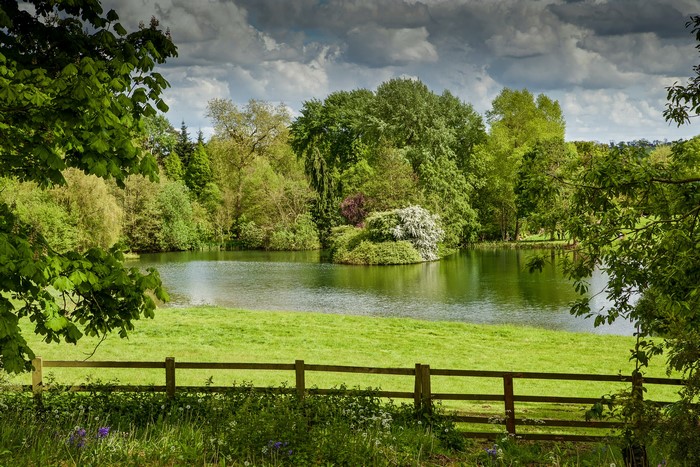 Lake and trees at Thenford, England