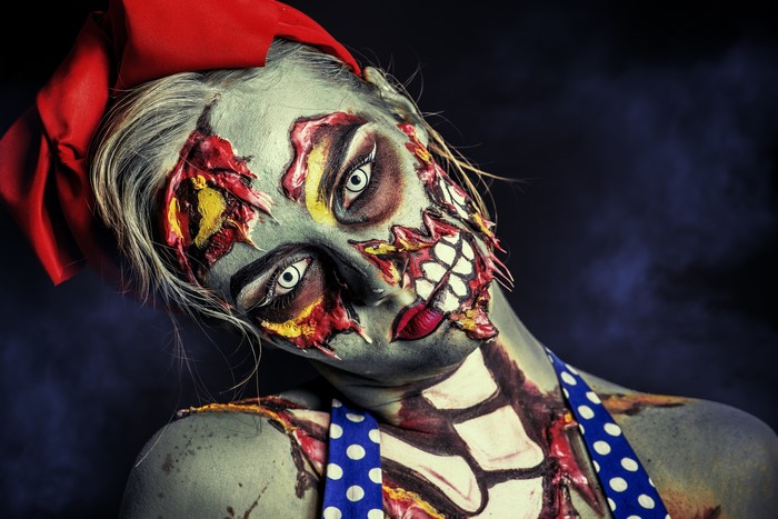 Zombie makeup with red bow