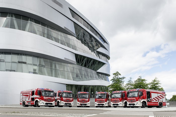 Mercedes-Benz Fire Engines in front of a modern building