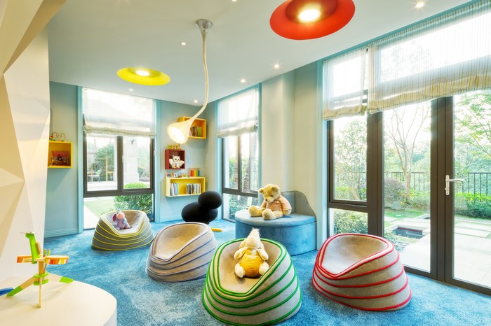 Children's room interior with toys and lamps