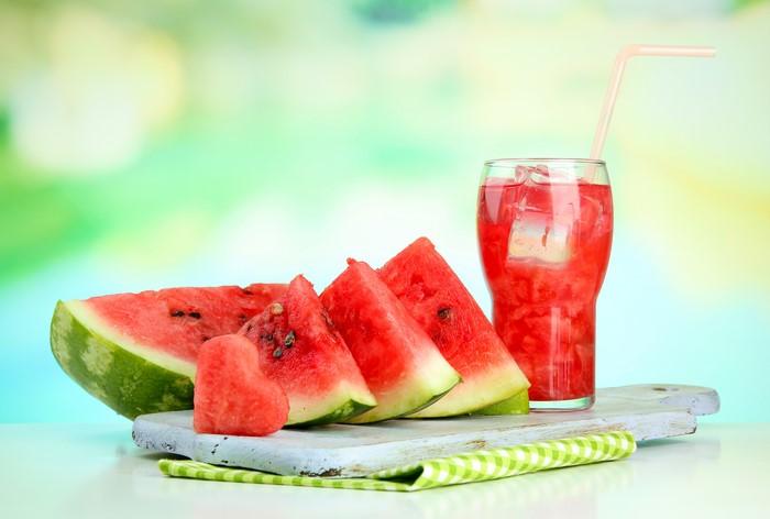 Watermelon slices and juice with ice