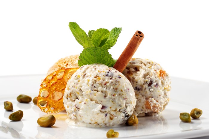 Ice cream scoops with pistachios, mint, and cinnamon