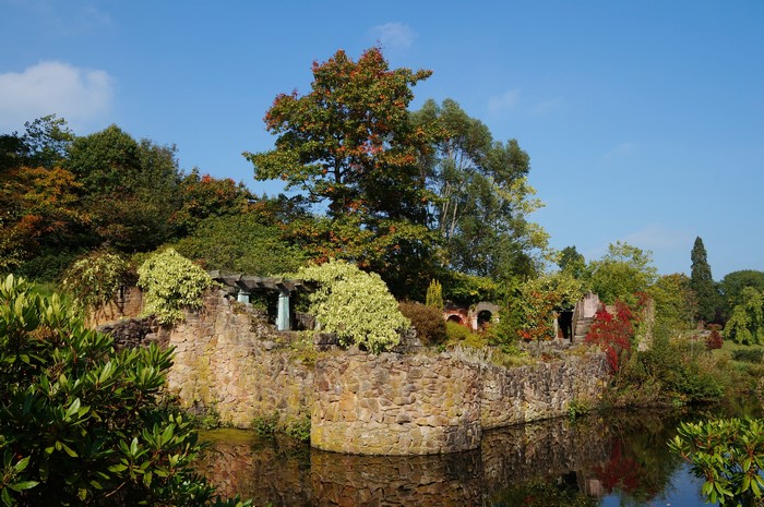 Consall Hall Gardens with pond and trees in the UK