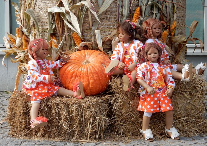 Dolls with pumpkin and corn display at Grugapark Essen