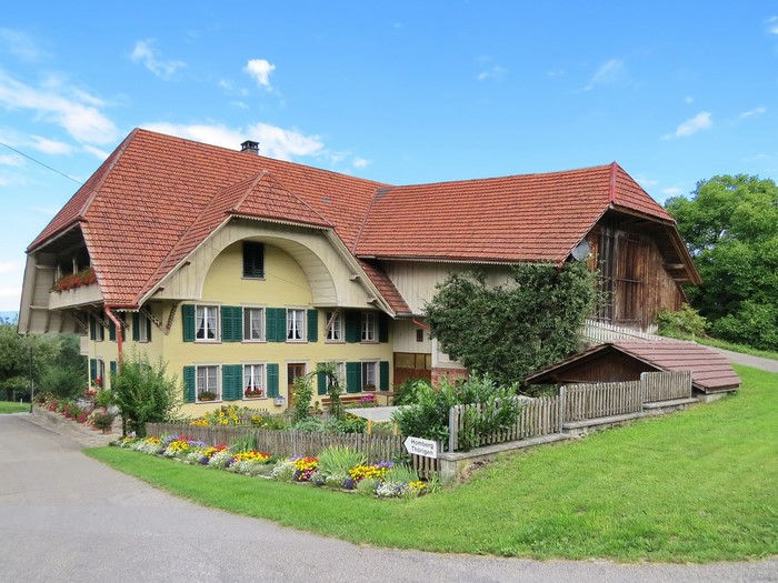 Spych, Switzerland: Traditional Farmhouse with Flower Garden