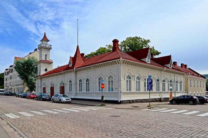 Wooden houses with red roofs in Kotka, Finland