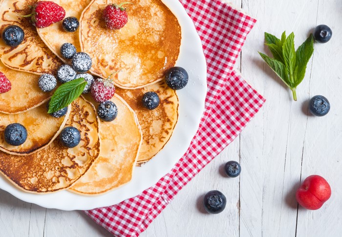 Pancakes with blueberries and strawberries
