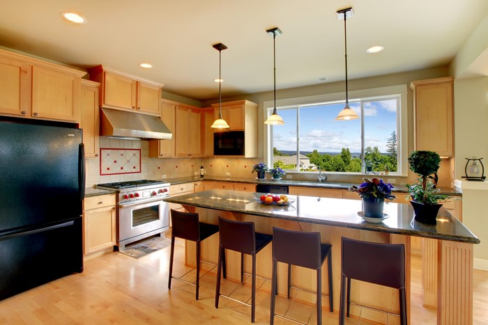 Modern kitchen with island and large window