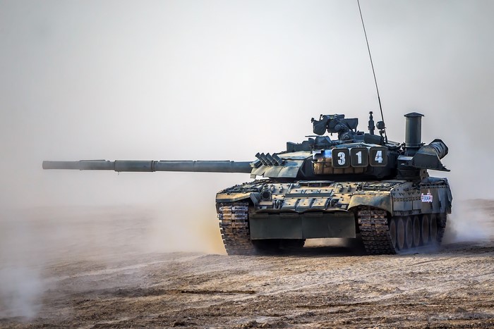Russian T-80UE-1 tank in dusty terrain