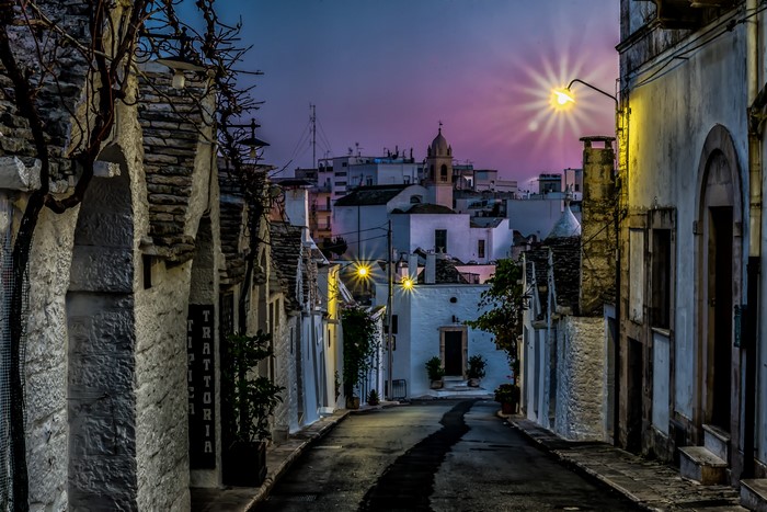 Street in Alberobello, Puglia, Italy at Dusk