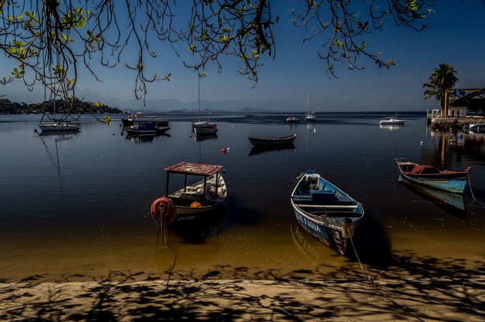 Boats moored in a calm bay in Brazil