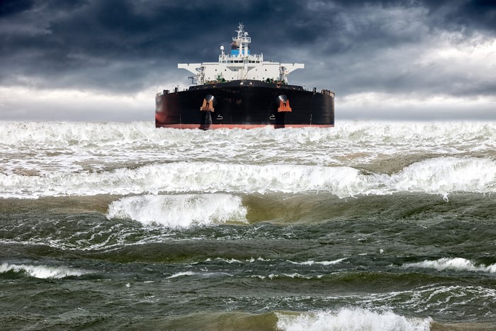 Tanker ship on rough seas under stormy skies
