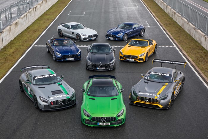 Many Mercedes-Benz AMG GT cars on a race track
