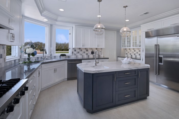 Modern Kitchen with Island and Stainless Steel Refrigerator