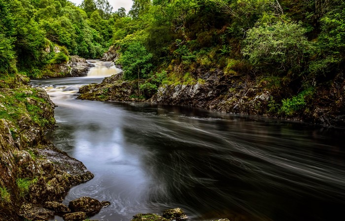 River Shin, Scotland, River Flowing Through Rocky Forest