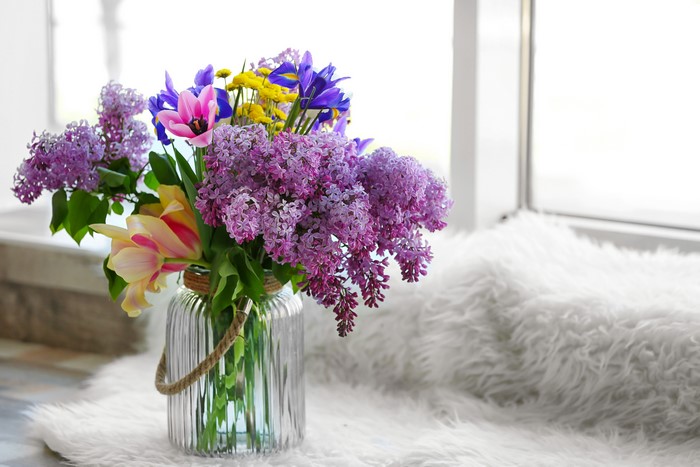 Bouquet of Lilacs, Tulips, and Irises in a Glass Jar