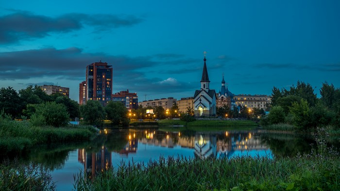 Evening view of Pulkovo, St. Petersburg with a river and buildings